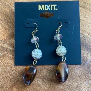 Mixit Dangle earrings with brown stones.